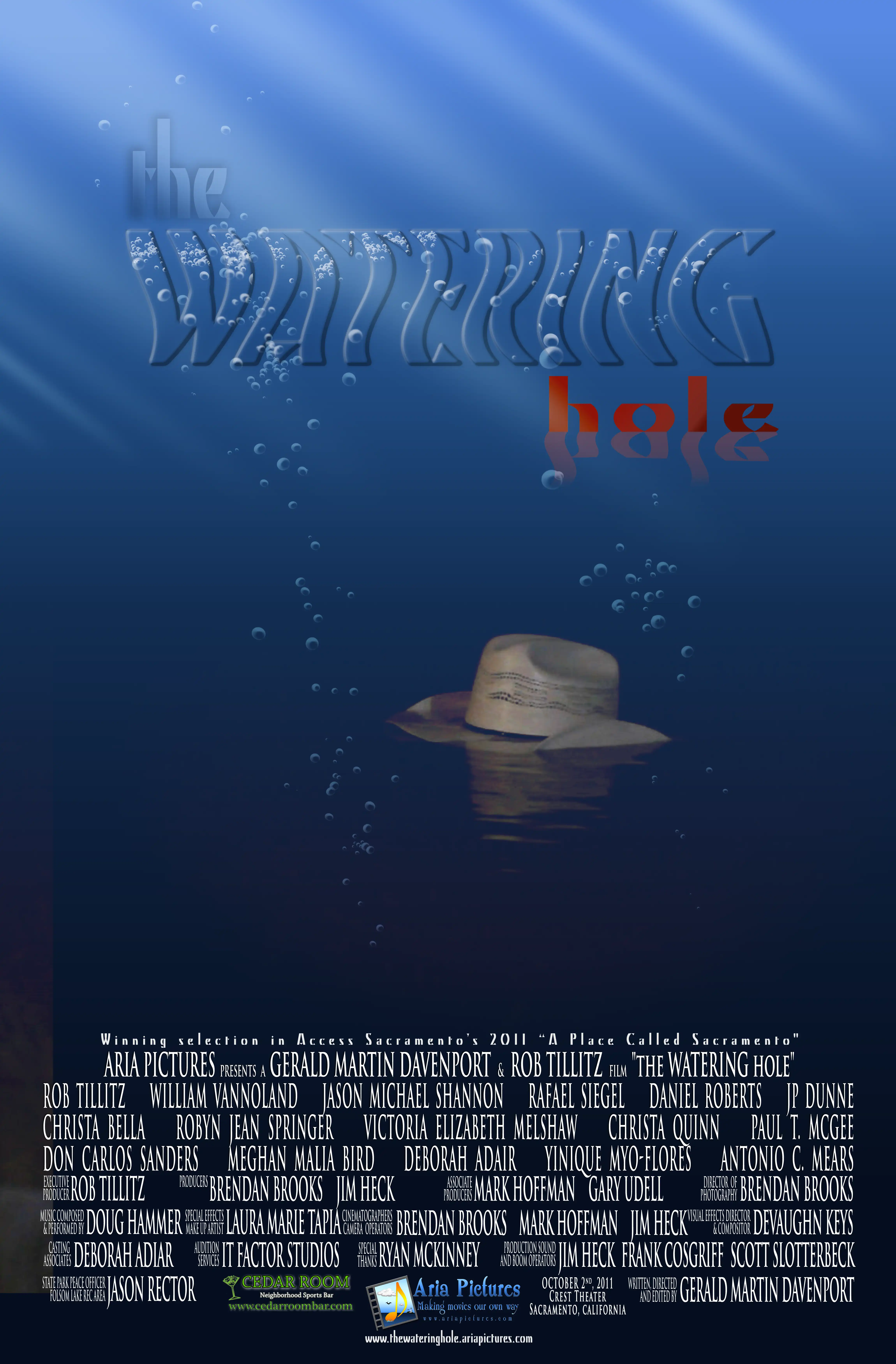 the WATERING hole (2011) poster with hat.